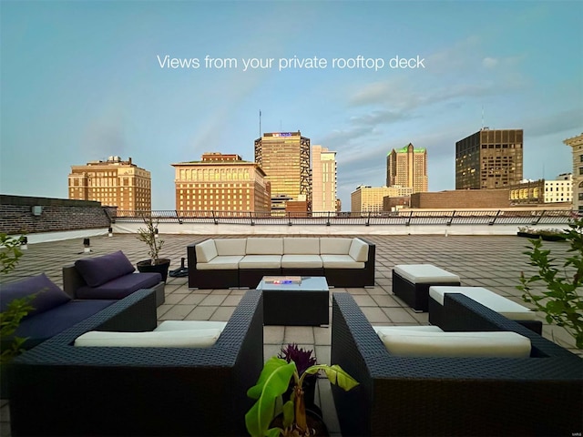 view of patio with outdoor lounge area and a skyline view
