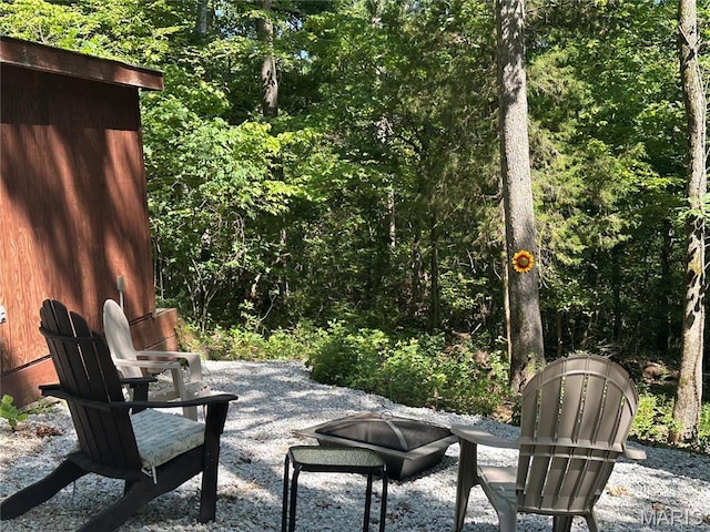 2359 Kitzbuhl Way S, Innsbrook, MO 63390 - view of patio with a forest view