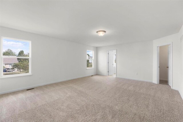 2438 Chukka Dr, Eureka, MO 63025 - spare room with light carpet and baseboards