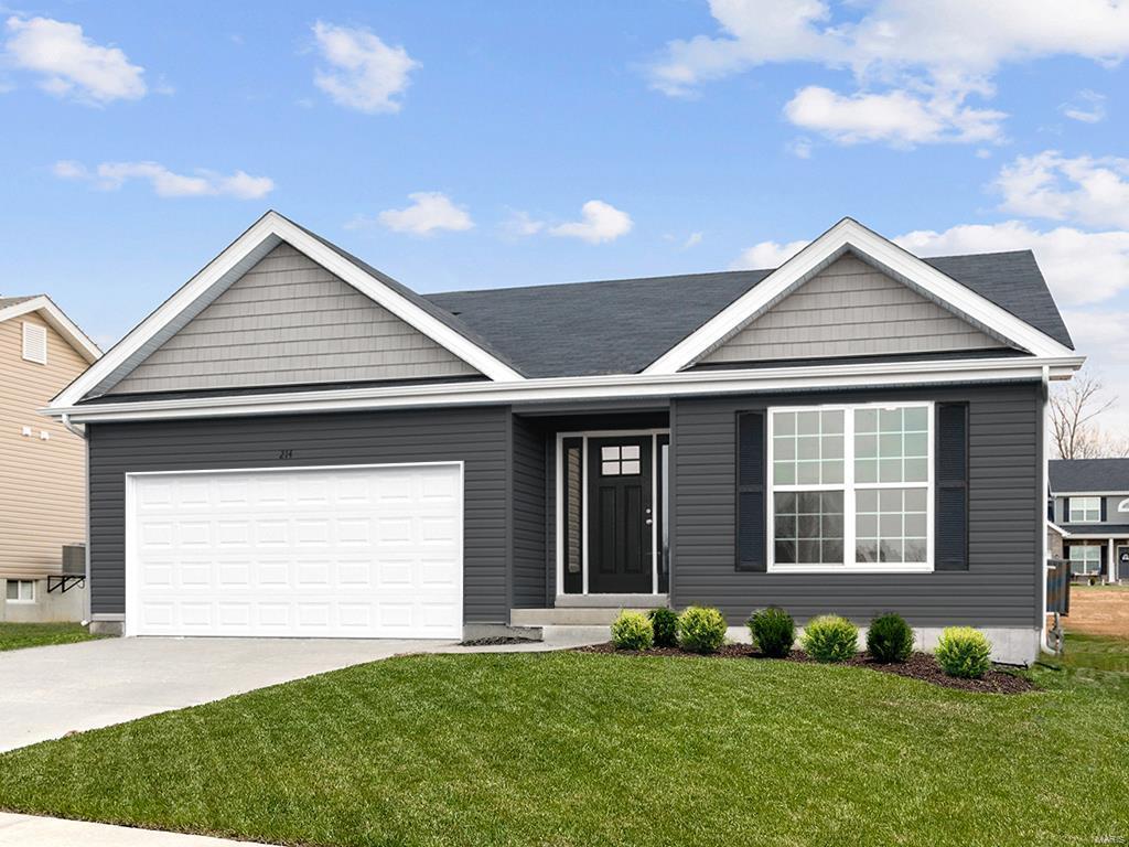 309 Winding Bluffs Ct, Fenton, MO 63026 - ranch-style house featuring an attached garage, a front lawn, and driveway