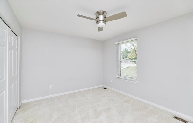 120 Kelcross, Wentzville, MO 63385 - unfurnished bedroom featuring a closet, light carpet, baseboards, and ceiling fan