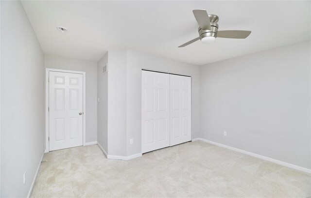 120 Kelcross, Wentzville, MO 63385 - unfurnished bedroom featuring light carpet, baseboards, a closet, and ceiling fan