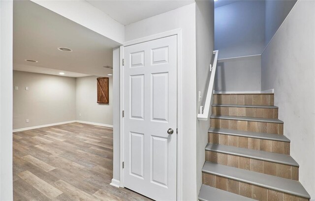120 Kelcross, Wentzville, MO 63385 - staircase featuring wood finished floors, baseboards, and recessed lighting