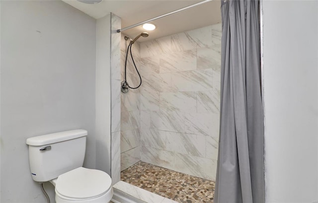 120 Kelcross, Wentzville, MO 63385 - bathroom featuring a tile shower and toilet