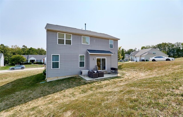 120 Kelcross, Wentzville, MO 63385 - rear view of property with outdoor lounge area, a yard, and a patio area