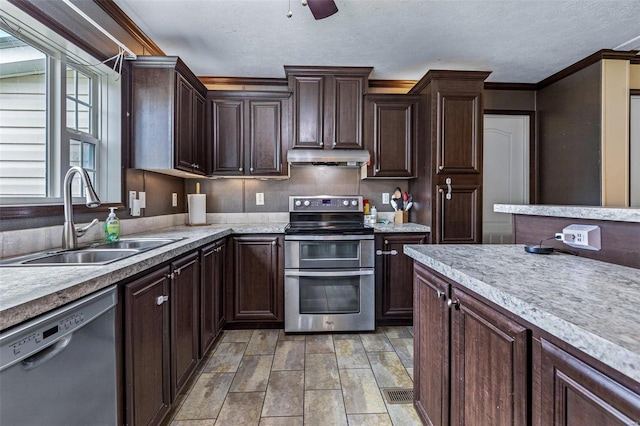 4002 County Road 20, Belleview, MO 63623 - kitchen featuring appliances with stainless steel finishes, a sink, extractor fan, light countertops, and a textured ceiling