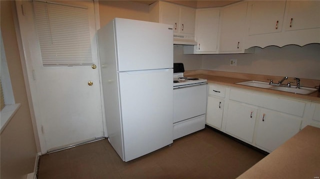 kitchen with white appliances, under cabinet range hood, a sink, and white cabinets