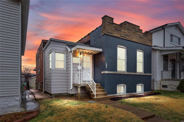 4634 Tyrolean Ave, Saint Louis, MO 63116 - view of front of home with a front lawn