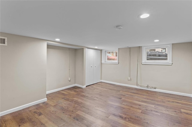 4634 Tyrolean Ave, Saint Louis, MO 63116 - below grade area featuring baseboards, wood finished floors, and recessed lighting