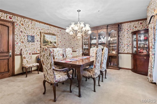 3112 Parkview Dr, Granite City, IL 62040 - dining room featuring wallpapered walls, crown molding, a chandelier, and light carpet