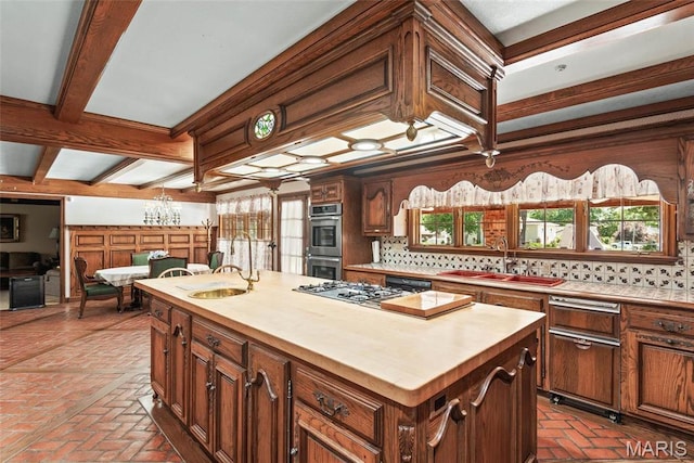 3112 Parkview Dr, Granite City, IL 62040 - kitchen with double oven, tasteful backsplash, brick flooring, a center island, and beam ceiling