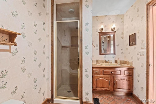 3112 Parkview Dr, Granite City, IL 62040 - bathroom with vanity, wallpapered walls, a stall shower, and brick patterned floors