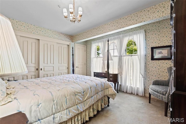 3112 Parkview Dr, Granite City, IL 62040 - bedroom featuring wallpapered walls, light carpet, a closet, and a chandelier