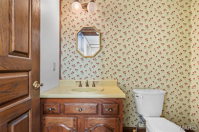 3112 Parkview Dr, Granite City, IL 62040 - half bathroom with vanity and wallpapered walls