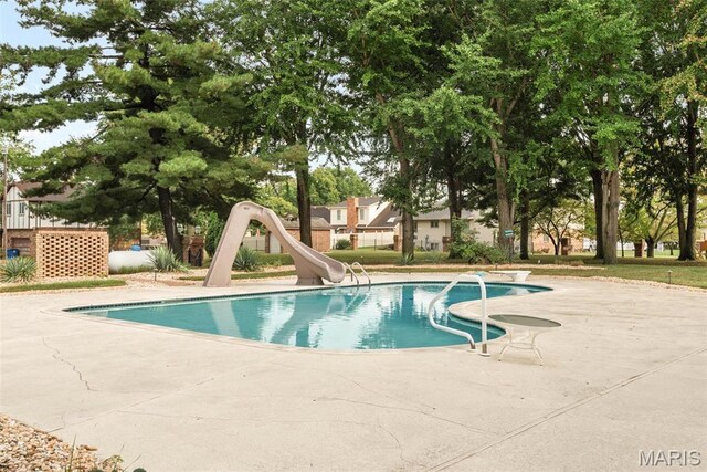 3112 Parkview Dr, Granite City, IL 62040 - view of pool featuring a water slide, a diving board, and a patio