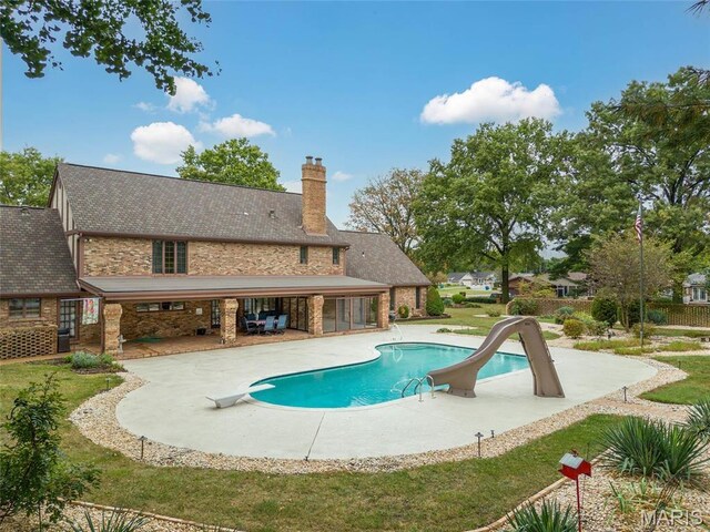 3112 Parkview Dr, Granite City, IL 62040 - swimming pool with a patio area and a diving board