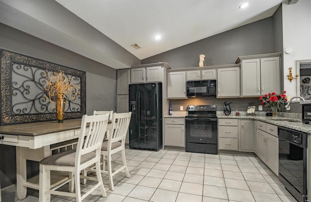 114 Mayson Ln, Poplar Bluff, MO 63901 - kitchen with black appliances, a sink, lofted ceiling, gray cabinetry, and light stone countertops