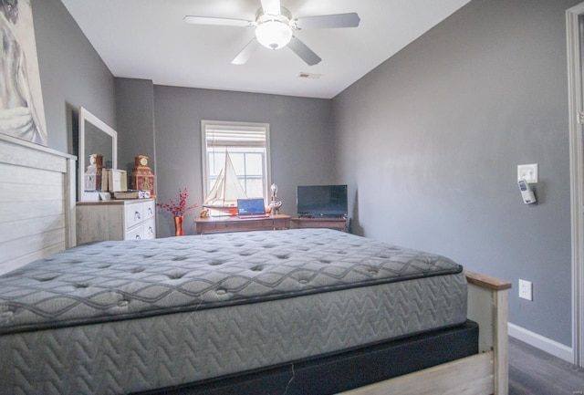 114 Mayson Ln, Poplar Bluff, MO 63901 - bedroom with wood finished floors, baseboards, and ceiling fan