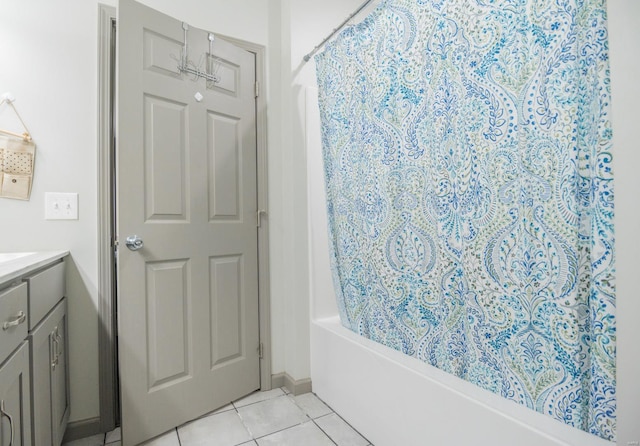 114 Mayson Ln, Poplar Bluff, MO 63901 - full bathroom featuring tile patterned floors, vanity, and shower / bath combo with shower curtain
