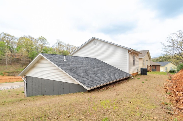 114 Mayson Ln, Poplar Bluff, MO 63901 - view of side of home with central AC unit and roof with shingles