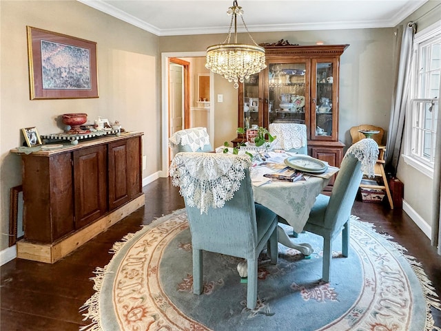 520 N Main St, Louisiana, MO 63353 - dining room featuring baseboards, a chandelier, dark wood-style flooring, and ornamental molding