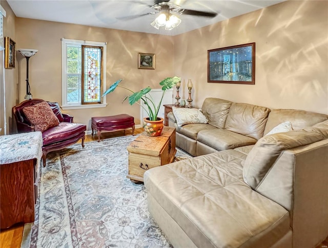 520 N Main St, Louisiana, MO 63353 - living area featuring ceiling fan and wood finished floors