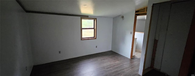 unfurnished bedroom featuring wood finished floors