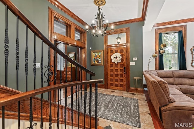 3623 Ohio Ave, Saint Louis, MO 63118 - foyer entrance with ornamental molding, a chandelier, and stairs