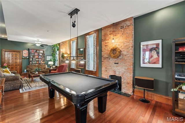 3623 Ohio Ave, Saint Louis, MO 63118 - rec room with a fireplace, wood-type flooring, a ceiling fan, and billiards table