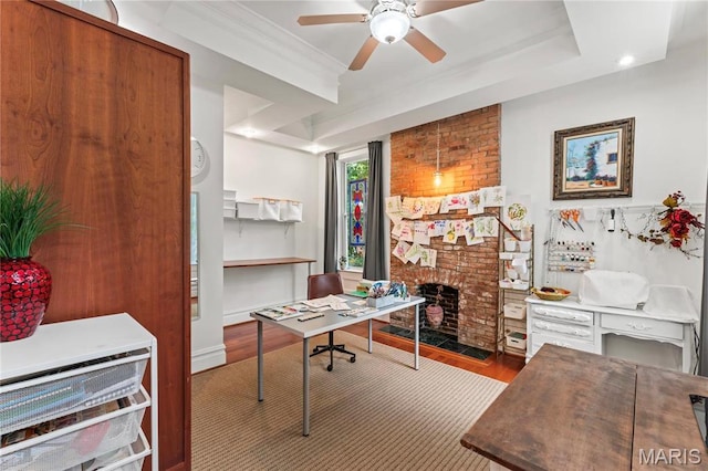 3623 Ohio Ave, Saint Louis, MO 63118 - home office with ceiling fan, wood finished floors, a brick fireplace, and crown molding