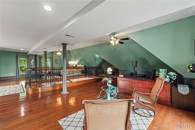 3623 Ohio Ave, Saint Louis, MO 63118 - living room featuring a ceiling fan, hardwood / wood-style flooring, ornate columns, and recessed lighting