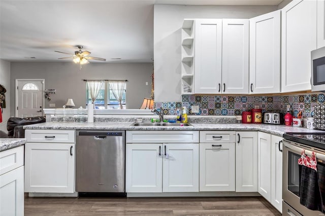 310 Crane St, Park Hills, MO 63601 - kitchen featuring stainless steel appliances, a sink, open shelves, and white cabinets