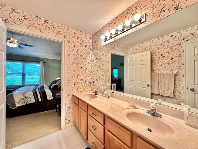 7427 Timberpoint Ct, Fairview Heights, IL 62208 - ensuite bathroom with tile patterned floors, double vanity, wallpapered walls, baseboards, and ceiling fan