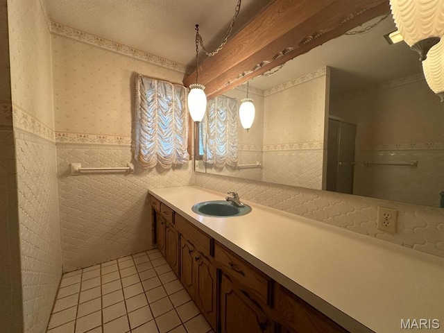 16347 Crestview Dr, Dexter, MO 63841 - bathroom featuring wallpapered walls, tile patterned floors, vanity, wainscoting, and a shower with shower door