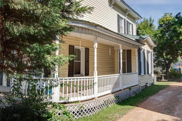 202 4th St, Carrollton, IL 62016 - view of exterior entry with a porch