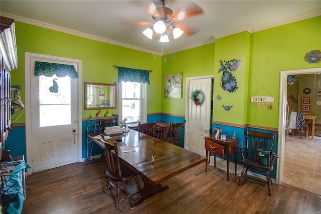 202 4th St, Carrollton, IL 62016 - dining room with healthy amount of natural light, ceiling fan, wood finished floors, and crown molding
