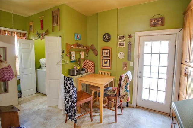 202 4th St, Carrollton, IL 62016 - dining room featuring plenty of natural light and washer / clothes dryer