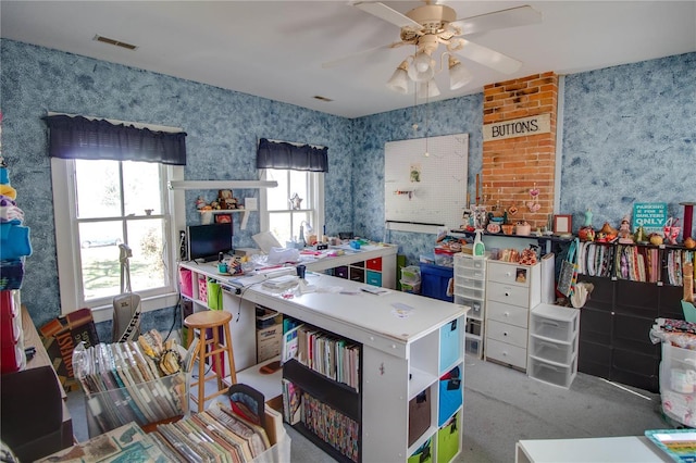202 4th St, Carrollton, IL 62016 - misc room featuring wallpapered walls, a ceiling fan, and carpet flooring