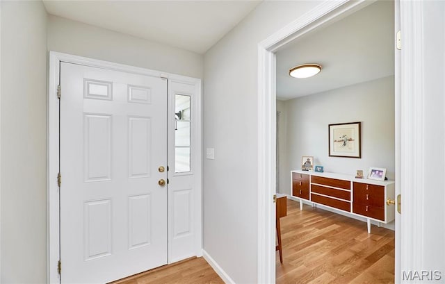 1538 Cattail Way, Saint Charles, MO 63303 - foyer featuring light wood finished floors and baseboards
