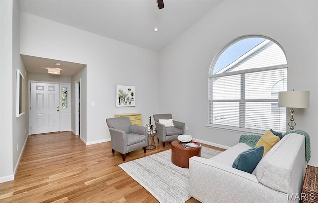 1538 Cattail Way, Saint Charles, MO 63303 - living room with light wood-type flooring, baseboards, and vaulted ceiling