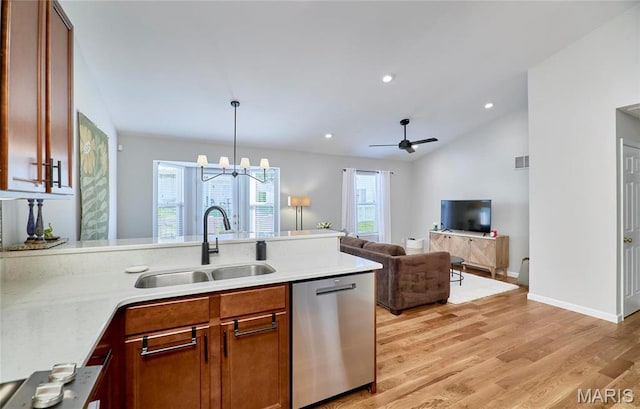 1538 Cattail Way, Saint Charles, MO 63303 - kitchen with dishwasher, a sink, a peninsula, light wood-style flooring, and light countertops
