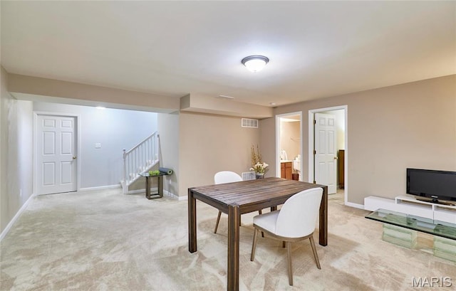 1538 Cattail Way, Saint Charles, MO 63303 - dining room with stairs, light carpet, and baseboards