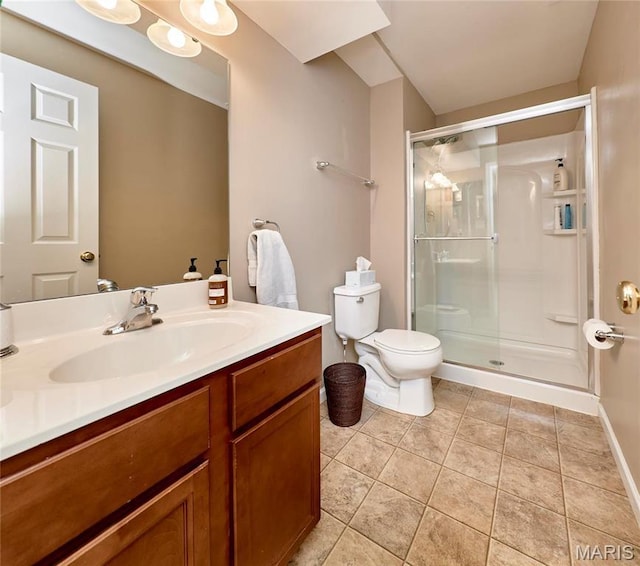 1538 Cattail Way, Saint Charles, MO 63303 - bathroom with a shower stall, toilet, vanity, and tile patterned flooring