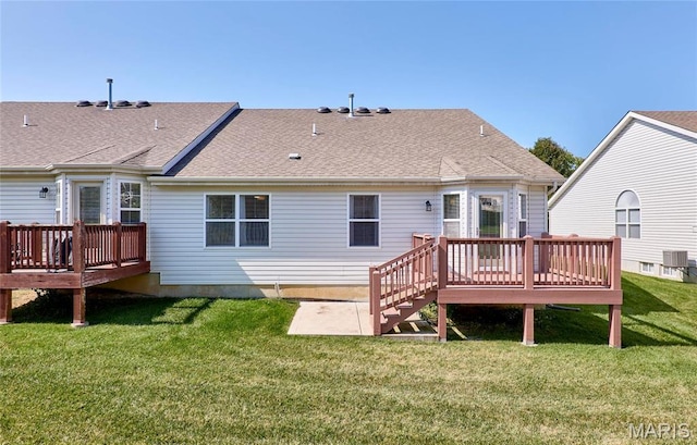 1538 Cattail Way, Saint Charles, MO 63303 - back of property featuring a deck, central AC unit, a lawn, and a shingled roof