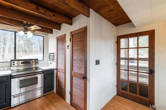 682 Shadow Lake Circle Dr, Innsbrook, MO 63390 - kitchen featuring appliances with stainless steel finishes, wood finished floors, plenty of natural light, wooden ceiling, and light countertops