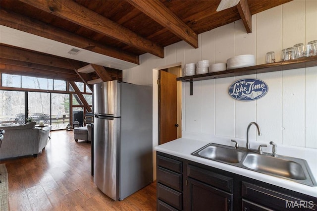682 Shadow Lake Circle Dr, Innsbrook, MO 63390 - kitchen with freestanding refrigerator, wood ceiling, beam ceiling, a sink, and dark wood-style flooring