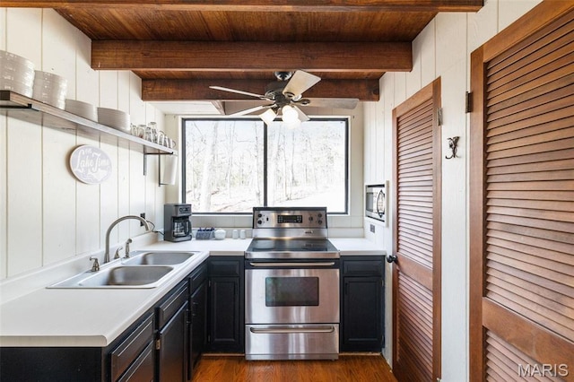 682 Shadow Lake Circle Dr, Innsbrook, MO 63390 - kitchen with stainless steel appliances, open shelves, a sink, dark cabinetry, and a ceiling fan