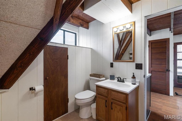 682 Shadow Lake Circle Dr, Innsbrook, MO 63390 - bathroom with toilet, beam ceiling, wood finished floors, and vanity
