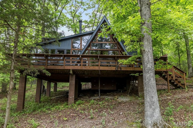682 Shadow Lake Circle Dr, Innsbrook, MO 63390 - rear view of property featuring a deck and stairs