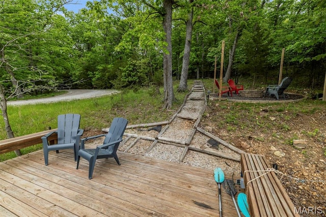 682 Shadow Lake Circle Dr, Innsbrook, MO 63390 - wooden terrace featuring a fire pit